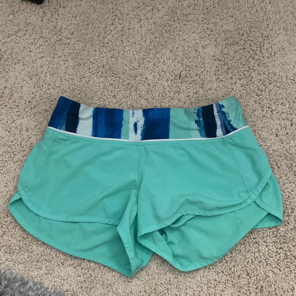 Turquoise lululemon running shorts